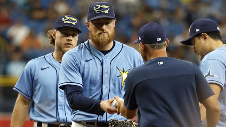 Tampa Bay Rays manager Kevin Cash comes to the mound to take out starting pitcher Drew Rasmussen. 