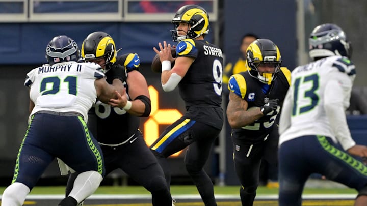 Nov 16, 2025; Inglewood, California, USA;  Los Angeles Rams quarterback Matthew Stafford (9) sets to pass against the Seattle Seahawks at SoFi Stadium. Mandatory Credit: Jayne Kamin-Oncea-Imagn Images
