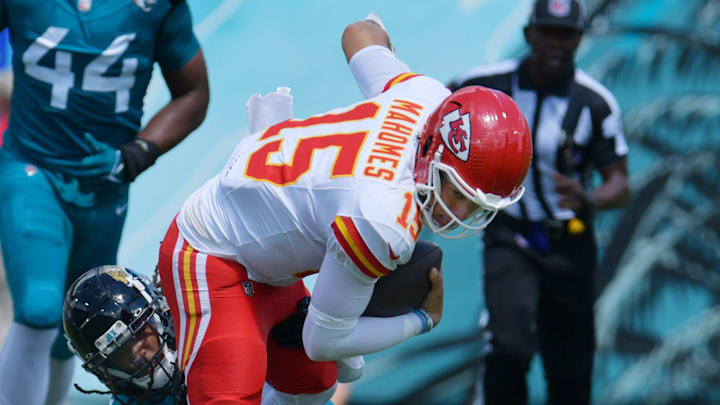 Jacksonville Jaguars safety Rayshawn Jenkins (2) makes the tackle on Kansas City Chiefs quarterback Patrick Mahomes (15) on a second quarter scramble for a first down. The Jacksonville Jaguars hosted the Kansas City Chiefs at EverBank Stadium in Jacksonville, FL Sunday, September 17, 2023. [Bob Self/Florida Times-Union]