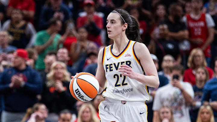 May 24, 2025; Indianapolis, Indiana, USA; Indiana Fever guard Caitlin Clark (22) dribbles the ball in the second half against the New York Liberty at Gainbridge Fieldhouse. Mandatory Credit: Trevor Ruszkowski-Imagn Images May 24, 2025; Indianapolis, Indiana, USA; Indiana Fever guard Caitlin Clark (22) dribbles the ball in the second half against the New York Liberty at Gainbridge Fieldhouse. Mandatory Credit: Trevor Ruszkowski-Imagn Images