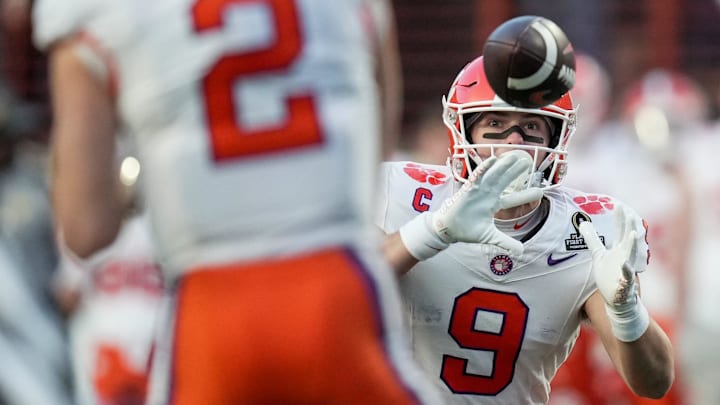 Clemson Tigers tight end Jake Briningstool (9) pulls the ball in for a first down against Texas Longhorns in the second half of an NCAA College Football Playoffs first round game at Darrell K Royal Texas Memorial Stadium, Austin, Texas, Saturday, Dec. 21, 2024.