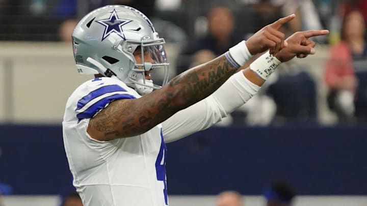 Dallas Cowboys quarterback Dak Prescott signals to teammates before a snap against the New York Giants at AT&T Stadium Dallas Cowboys quarterback Dak Prescott signals to teammates before a snap against the New York Giants at AT&T Stadium