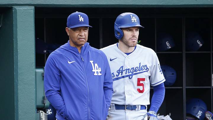 Sep 10, 2023; Washington, District of Columbia, USA; Los Angeles Dodgers manager Dave Roberts (30) and Dodgers first baseman Freddie Freeman (5) look on from the dugout durining the eighth inning against the Washington Nationals at Nationals Park. Mandatory Credit: Amber Searls-Imagn Images Sep 10, 2023; Washington, District of Columbia, USA; Los Angeles Dodgers manager Dave Roberts (30) and Dodgers first baseman Freddie Freeman (5) look on from the dugout durining the eighth inning against the Washington Nationals at Nationals Park. Mandatory Credit: Amber Searls-Imagn Images