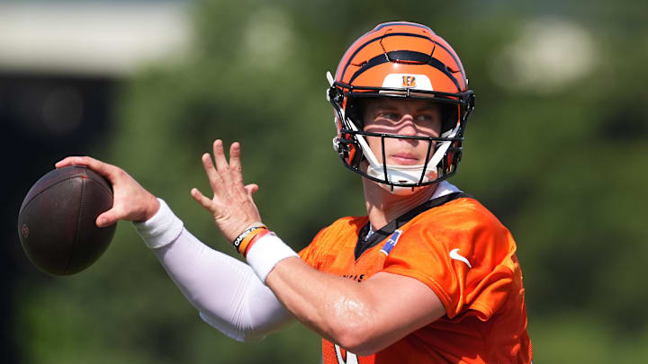 Jul 25, 2025; Cincinnati, OH, USA; Cincinnati Bengals quarterback Joe Burrow (9) throws during training camp practice. Mandatory Credit: Kareem Elgazzar-Imagn Images