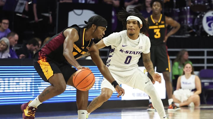 Feb 23, 2025; Manhattan, Kansas, USA; Arizona State Sun Devils guard Alston Mason (1) is guarded by Kansas State Wildcats guard Dug McDaniel (0) during the second half at Bramlage Coliseum. Mandatory Credit: Scott Sewell-Imagn Images Feb 23, 2025; Manhattan, Kansas, USA; Arizona State Sun Devils guard Alston Mason (1) is guarded by Kansas State Wildcats guard Dug McDaniel (0) during the second half at Bramlage Coliseum. Mandatory Credit: Scott Sewell-Imagn Images