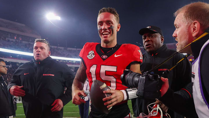 Nov 16, 2024; Athens, Georgia, USA; Georgia Bulldogs quarterback Carson Beck (15) celebrates after a victory over the Tennessee Volunteers at Sanford Stadium. Mandatory Credit: Brett Davis-Imagn Images

