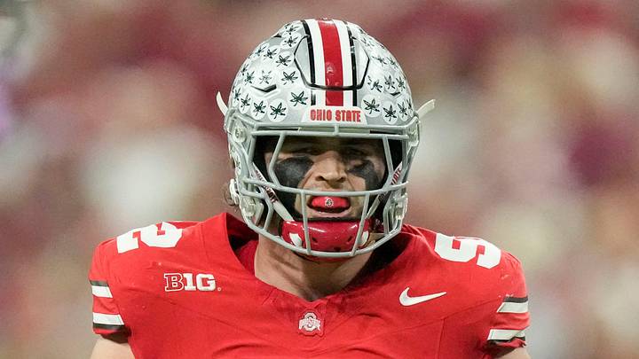 Ohio State Buckeyes defensive end Caden Curry reacts after a stop Saturday