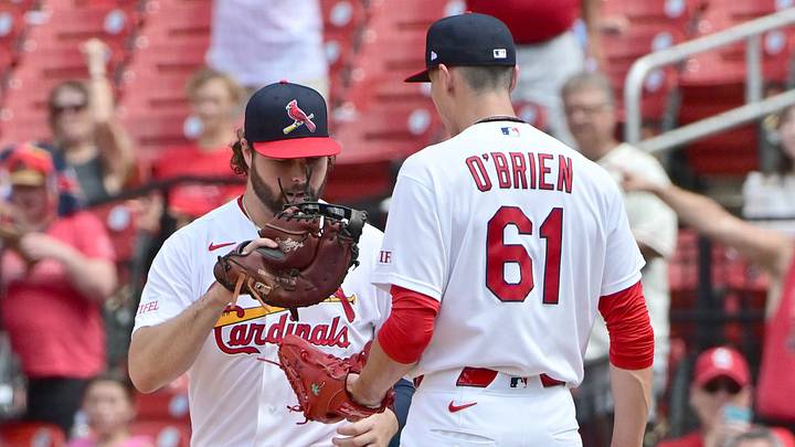 Jun 28, 2026; St. Louis, Missouri, USA; St. Louis Cardinals first baseman Alec Burleson (41) gives the ball to St. Louis Cardinals pitcher Riley O'Brien (61) after the last out on the Miami Marlins at Busch Stadium. Mandatory Credit: Tim Vizer-Imagn Images Jun 28, 2026; St. Louis, Missouri, USA; St. Louis Cardinals first baseman Alec Burleson (41) gives the ball to St. Louis Cardinals pitcher Riley O'Brien (61) after the last out on the Miami Marlins at Busch Stadium. Mandatory Credit: Tim Vizer-Imagn Images