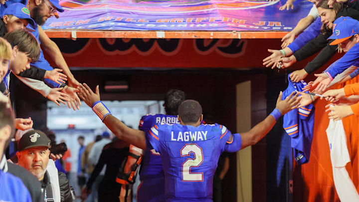 Florida quarterback DJ Lagway (2) leaves the field after beating Florida State 40-21. Florida quarterback DJ Lagway (2) leaves the field after beating Florida State 40-21.