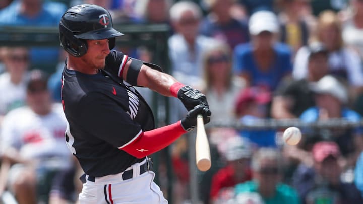 Minnesota Twins' Kyler Fedko hits a go-ahead single during a spring training game against the Colorado Rockies at Lee Health Sports Complex in Fort Myers, Fla., on Tuesday, March 25, 2025.