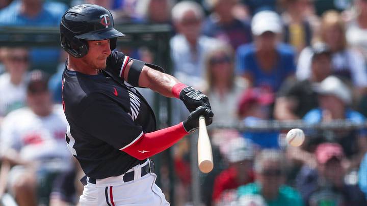 Minnesota Twins' Kyler Fedko hits a go-ahead single during a spring training game against the Colorado Rockies at Lee Health Sports Complex in Fort Myers, Fla., on Tuesday, March 25, 2025.
