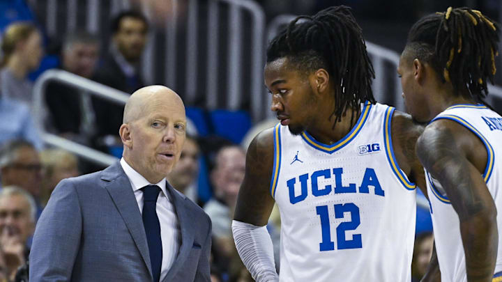 Nov 4, 2024; Los Angeles, California, USA; UCLA Bruins head coach Mick Cronin with guards Sebastian Mack (12) and Dylan Andrews (2) during the first half against the Rider Broncs at Pauley Pavilion presented by Wescom. Mandatory Credit: Robert Hanashiro-Imagn Images Nov 4, 2024; Los Angeles, California, USA; UCLA Bruins head coach Mick Cronin with guards Sebastian Mack (12) and Dylan Andrews (2) during the first half against the Rider Broncs at Pauley Pavilion presented by Wescom. Mandatory Credit: Robert Hanashiro-Imagn Images