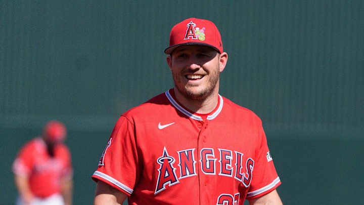 Feb 24, 2026; Tempe, Arizona, USA; Los Angeles Angels designated hitter Mike Trout (27) smiles as he warms up before the start of a spring training game against the San Francisco Giants at Tempe Diablo Stadium. Mandatory Credit: Allan Henry-Imagn Images