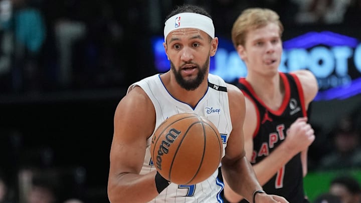 Orlando Magic guard Jalen Suggs (4) controls the ball against the Toronto Raptors during the second quarter at Scotiabank Arena.