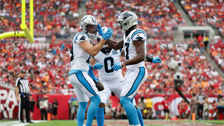 Dec 29, 2024; Tampa, Florida, USA; Carolina Panthers wide receiver Adam Thielen (19) celebrates with wide receiver Xavier Legette (17)after scoring a touchdown against the Tampa Bay Buccaneers in the first quarter at Raymond James Stadium. Dec 29, 2024; Tampa, Florida, USA; Carolina Panthers wide receiver Adam Thielen (19) celebrates with wide receiver Xavier Legette (17)after scoring a touchdown against the Tampa Bay Buccaneers in the first quarter at Raymond James Stadium.