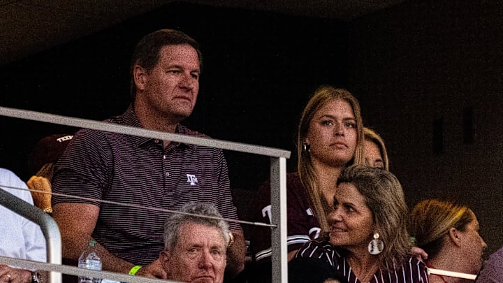Jun 22, 2024; Omaha, NE, USA; Texas A&M Aggies athletic director Trev Alberts sits in a suite during the fifth inning against the Tennessee Volunteers at Charles Schwab Field Omaha. Mandatory Credit: Dylan Widger-Imagn Images