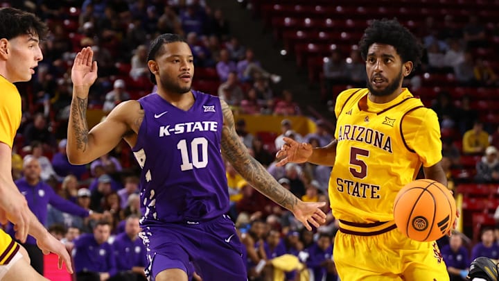Jan 10, 2026; Tempe, Arizona, USA; Arizona State Sun Devils guard Maurice Odum (5) drives to the basket against Kansas State Wildcats guard David Castillo (10) in the second half at Desert Financial Arena. Mandatory Credit: Mark J. Rebilas-Imagn Images Jan 10, 2026; Tempe, Arizona, USA; Arizona State Sun Devils guard Maurice Odum (5) drives to the basket against Kansas State Wildcats guard David Castillo (10) in the second half at Desert Financial Arena. Mandatory Credit: Mark J. Rebilas-Imagn Images