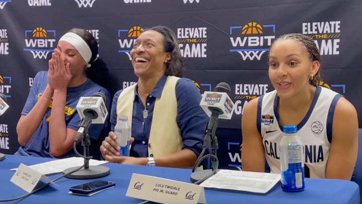 Sakima Walker, left, and coach Charmin Smith laugh after Lulu Twidale's reaction to no AC at Haas