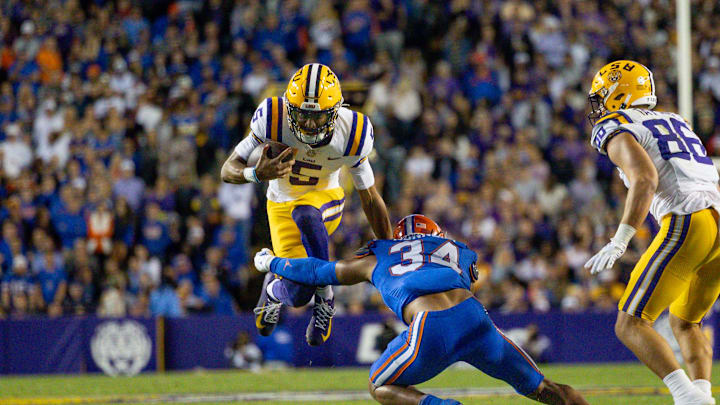 Nov 11, 2023; Baton Rouge, Louisiana, USA;  LSU Tigers quarterback Jayden Daniels (5) attempts to