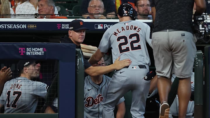 Oct 2, 2024; Houston, Texas, USA; Detroit Tigers outfielder Parker Meadows (22) celebrates with manager A.J. Hinch (left) after hitting a home run against the Houston Astros during the sixth inning of game two of the Wildcard round for the 2024 MLB Playoffs at Minute Maid Park.