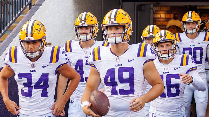 Sep 20, 2025; Baton Rouge, Louisiana, USA;  LSU Tigers long snapper Jonathan Ferguson (49) and LSU Tigers place kicker Damian Ramos (34) during warmups before the game against the Southeastern Louisiana Lions at Tiger Stadium. Mandatory Credit: Stephen Lew-Imagn Images