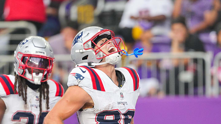 Aug 16, 2025; Minneapolis, Minnesota, USA; New England Patriots wide receiver Efton Chism III (86) celebrates his touchdown against the Minnesota Vikings in the second quarter at U.S. Bank Stadium. Mandatory Credit: Brad Rempel-Imagn Images