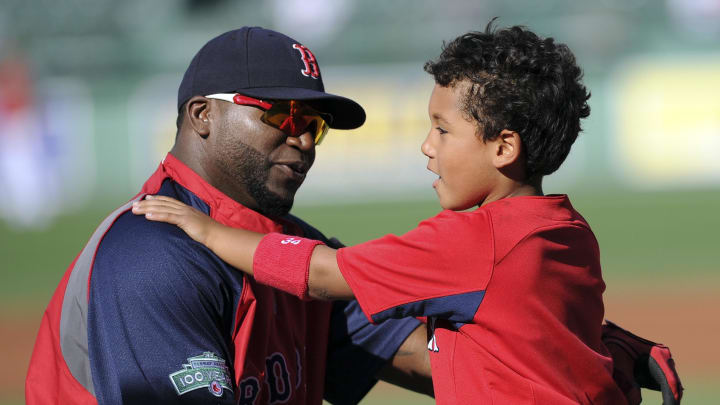 May 31, 2012; Boston, MA, USA; Boston Red Sox designated hitter David Ortiz (34) with his son D'Angelo Ortiz  prior to a game against the Detroit Tigers at Fenway Park.
