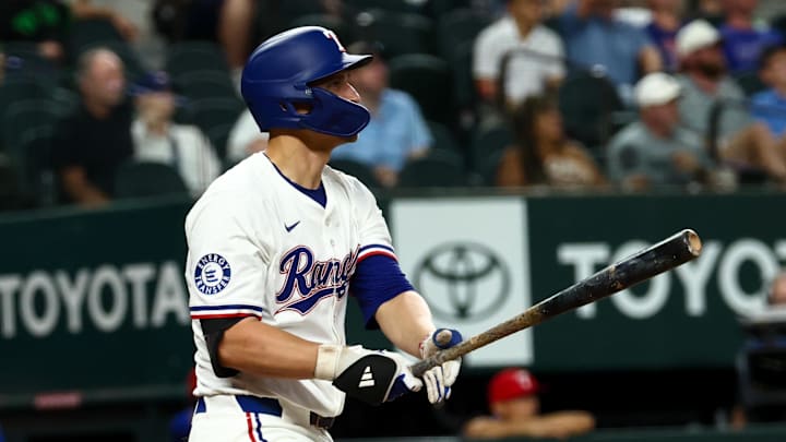 Aug 27, 2025; Arlington, Texas, USA; Texas Rangers shortstop Corey Seager (5) hits a two-run home run during the fourth inning against the Los Angeles Angels at Globe Life Field. Aug 27, 2025; Arlington, Texas, USA; Texas Rangers shortstop Corey Seager (5) hits a two-run home run during the fourth inning against the Los Angeles Angels at Globe Life Field.
