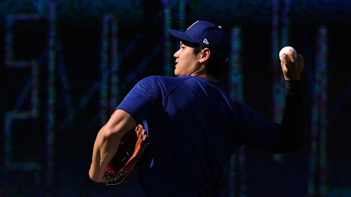Jun 2, 2025; Los Angeles, California, USA; Los Angeles Dodgers designated hitter Shohei Ohtani (17) warms up before a game against the New York Mets at Dodger Stadium. Mandatory Credit: Jason Parkhurst-Imagn Images Jun 2, 2025; Los Angeles, California, USA; Los Angeles Dodgers designated hitter Shohei Ohtani (17) warms up before a game against the New York Mets at Dodger Stadium. Mandatory Credit: Jason Parkhurst-Imagn Images