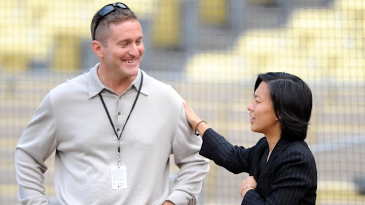 Arizona Diamondbacks general manager Josh Byrnes (left) and Los Angeles Dodgers vice president and assistant general manager Kim Ng before the game at Dodger Stadium in Sept. 2009.
