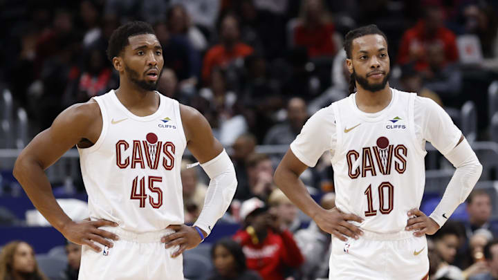 Dec 12, 2025; Washington, District of Columbia, USA; Cleveland Cavaliers guard Donovan Mitchell (45) stands next to Cavaliers guard Darius Garland (10) on court during a stoppage in play against the Washington Wizards in the second half at Capital One Arena. Mandatory Credit: Geoff Burke-Imagn Images