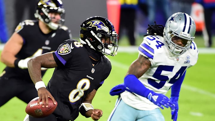 Dec 8, 2020; Baltimore, Maryland, USA; Baltimore Ravens quarterback Lamar Jackson (8) runs away from Dallas Cowboys linebacker Jaylon Smith (54) in the first quarter at M&T Bank Stadium. Mandatory Credit: Evan Habeeb-Imagn Images Dec 8, 2020; Baltimore, Maryland, USA; Baltimore Ravens quarterback Lamar Jackson (8) runs away from Dallas Cowboys linebacker Jaylon Smith (54) in the first quarter at M&T Bank Stadium. Mandatory Credit: Evan Habeeb-Imagn Images