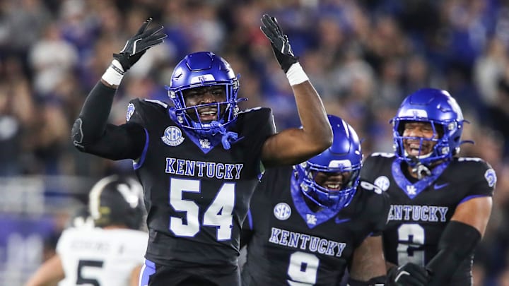Linebacker D'Eryk Jackson (54) of the Kentucky Wildcats celebrates after making an interception against Vanderbilt in the first half. The Commodores defeated the Wildcats 20-13 at Kroger Field Saturday, Oct. 12, 2024 in Lexington, Ky.