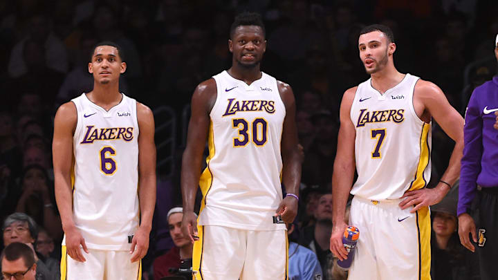 Jan 21, 2018; Los Angeles, CA, USA;  Los Angeles Lakers guard Jordan Clarkson (6), forward Julius Randle (30) and forward Larry Nance Jr. (7) look on from the bench in the fourth quarter of the game at Staples Center. Mandatory Credit: Jayne Kamin-Oncea-Imagn Images