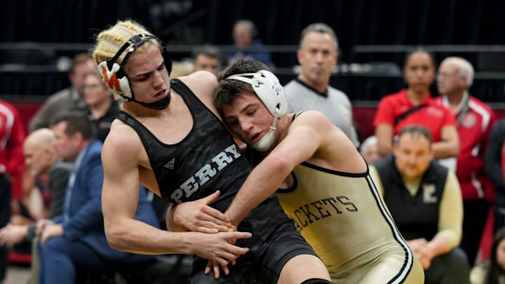 Grey Burnett of Perrysburg (right) is at the top of the boys 126-pound national rankings.