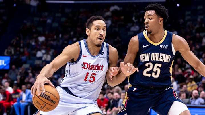 Washington Wizards guard Malcolm Brogdon dribbles against New Orleans Pelicans guard Trey Murphy III. Washington Wizards guard Malcolm Brogdon dribbles against New Orleans Pelicans guard Trey Murphy III.