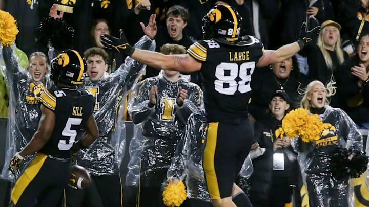 Iowa’s Jacob Gill (5) and Hayden Large (88) celebrate Gill’s touchdown against Wisconsin Saturday, Nov. 2, 2024 at Kinnick Stadium in Iowa City, Iowa.