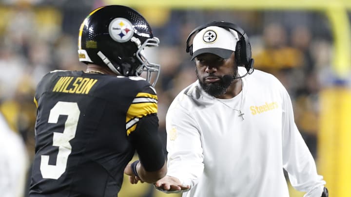 Oct 20, 2024; Pittsburgh, Pennsylvania, USA;  Pittsburgh Steelers head coach Mike Tomlin (right) congratulates quarterback Russell Wilson (3) on his touchdown pass against the New York Jets during the second quarter at Acrisure Stadium. Mandatory Credit: Charles LeClaire-Imagn Images