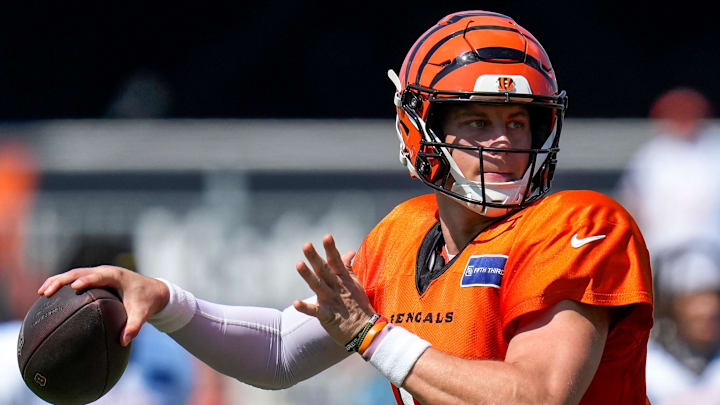 Cincinnati Bengals quarterback Joe Burrow (9) throws a pass during a preseason training camp practice in downtown Cincinnati on Wednesday, July 30, 2025.