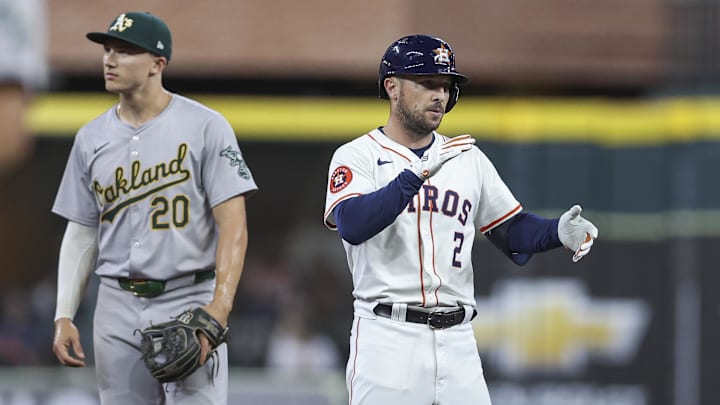 Sep 11, 2024; Houston, Texas, USA; Houston Astros third baseman Alex Bregman (2) reacts after hitting a double during the second inning against the Oakland Athletics at Minute Maid Park.
