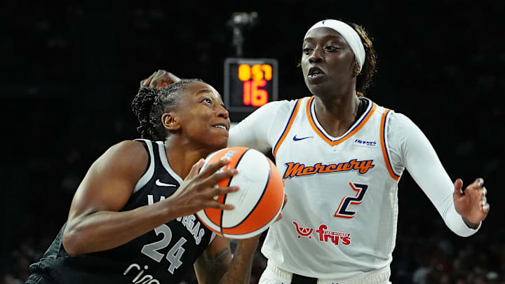 Oct 3, 2025; Las Vegas, Nevada, USA; Las Vegas Aces guard Jewell Loyd (24) drives against Phoenix Mercury guard Kahleah Copper (2) during the fourth quarter of game one of the 2025 WNBA Finals at Michelob Ultra Arena. Mandatory Credit: Stephen R. Sylvanie-Imagn Images Oct 3, 2025; Las Vegas, Nevada, USA; Las Vegas Aces guard Jewell Loyd (24) drives against Phoenix Mercury guard Kahleah Copper (2) during the fourth quarter of game one of the 2025 WNBA Finals at Michelob Ultra Arena. Mandatory Credit: Stephen R. Sylvanie-Imagn Images