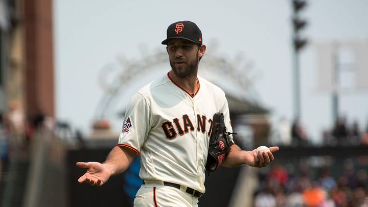 Aug 7, 2018; San Francisco, CA, USA; San Francisco Giants starting pitcher Madison Bumgarner (40) reacts to a comment from the home plate umpire during the second inning of the game against the Houston Astros at AT&T Park. Mandatory Credit: Ed Szczepanski-Imagn Images