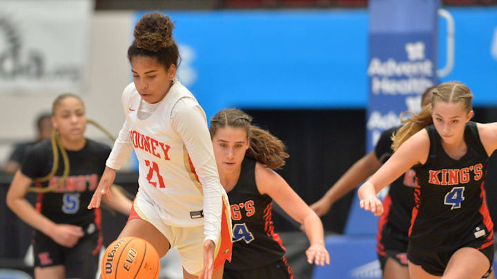 Cardinal Mooney forward Kali Barrett (#21) starts a fast break as the King's Academy defenders try and catch up. Cardinal Mooney defeated King's Academy Wednesday, Feb. 23, 2022 in the Class 3A bracket in the girls state basketball tournament in Lakeland.

Sar Mooney Girls Basketball 001