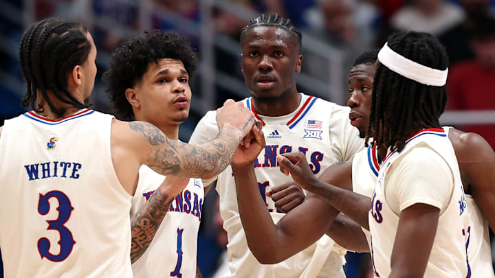Kansas basketball players (from left to right) Tre White, Jayden Dawson, Flory Bidunga, Melvin Council Jr., and Jamari McDowell