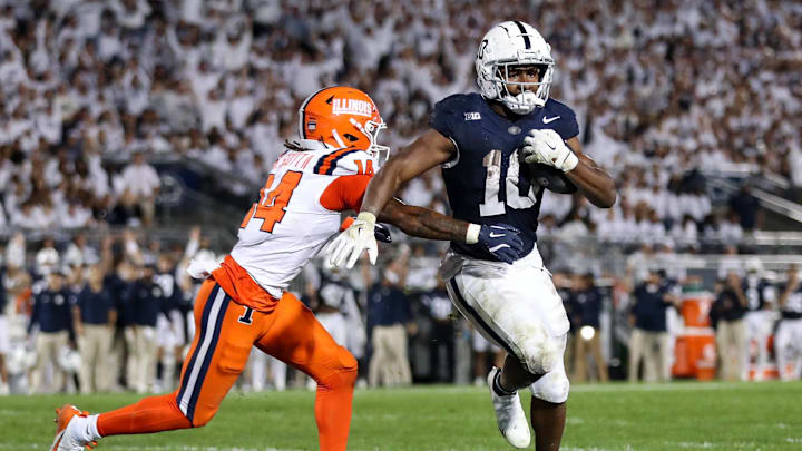 Penn State running back Nicholas Singleton runs for a touchdown during the third quarter against Illinois at Beaver Stadium.
