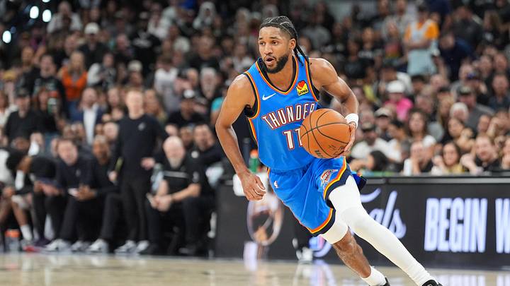 May 24, 2026; San Antonio, Texas, USA; Oklahoma City Thunder guard Isaiah Joe (11) moves the ball in the fourth quarter against the San Antonio Spurs during game four of the western conference finals for the 2026 NBA playoffs at Frost Bank Center. Mandatory Credit: Daniel Dunn-Imagn Images