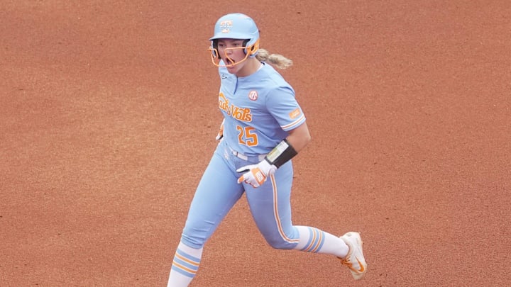 Tennessee utility player Ella Dodge (25) celebrates a home run while running the bases during an NCAA super regional game between Tennessee and Nebraska at Sherri Parker Lee Stadium in Knoxville, Tenn., on May 24, 2025. Tennessee defeated Nebraska.