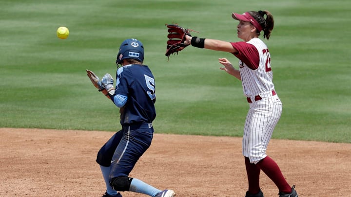 Florida State Seminoles infielder Leslie Farris (26) barely misses getting the put at second base. The Florida State Seminoles host the UNC Tar Heels for the ACC Softball Tournament finals Saturday, May 11, 2019.