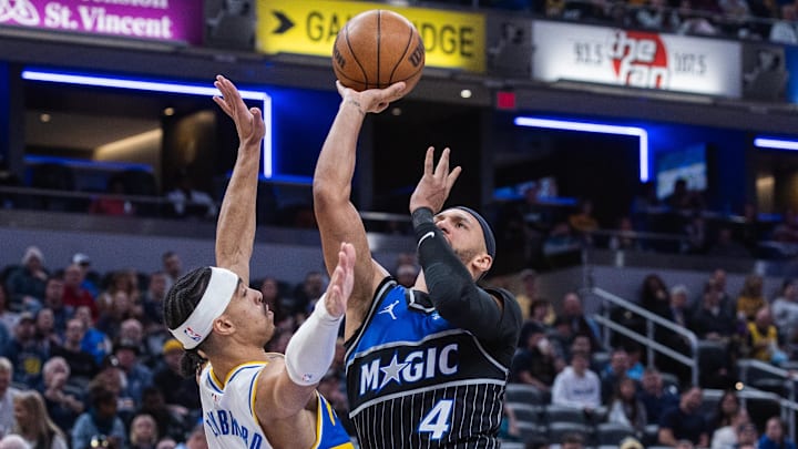 Dec 31, 2025; Indianapolis, Indiana, USA; Orlando Magic guard Jalen Suggs (4) shoots the ball while Indiana Pacers guard/forward Andrew Nembhard (2) defends in the second half at Gainbridge Fieldhouse. Dec 31, 2025; Indianapolis, Indiana, USA; Orlando Magic guard Jalen Suggs (4) shoots the ball while Indiana Pacers guard/forward Andrew Nembhard (2) defends in the second half at Gainbridge Fieldhouse.