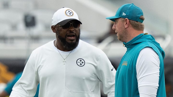 Steelers Head Coach Mike Tomlin, left and Jaguars Head Coach Liam Coen talks before the first preseason game where the Jacksonville Jaguars hosted the Pittsburgh Steelers Saturday Aug. 9, 2025, at EverBank Stadium in Jacksonville, Fla. [Doug Engle/Florida Times-Union]